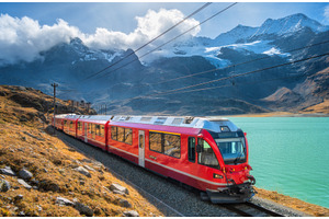 Red modern train is moving along, a Transportation Photo by den-belitsky