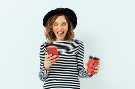 Excited joyful young woman wearing fashionable hat, a Person Photo by progressman