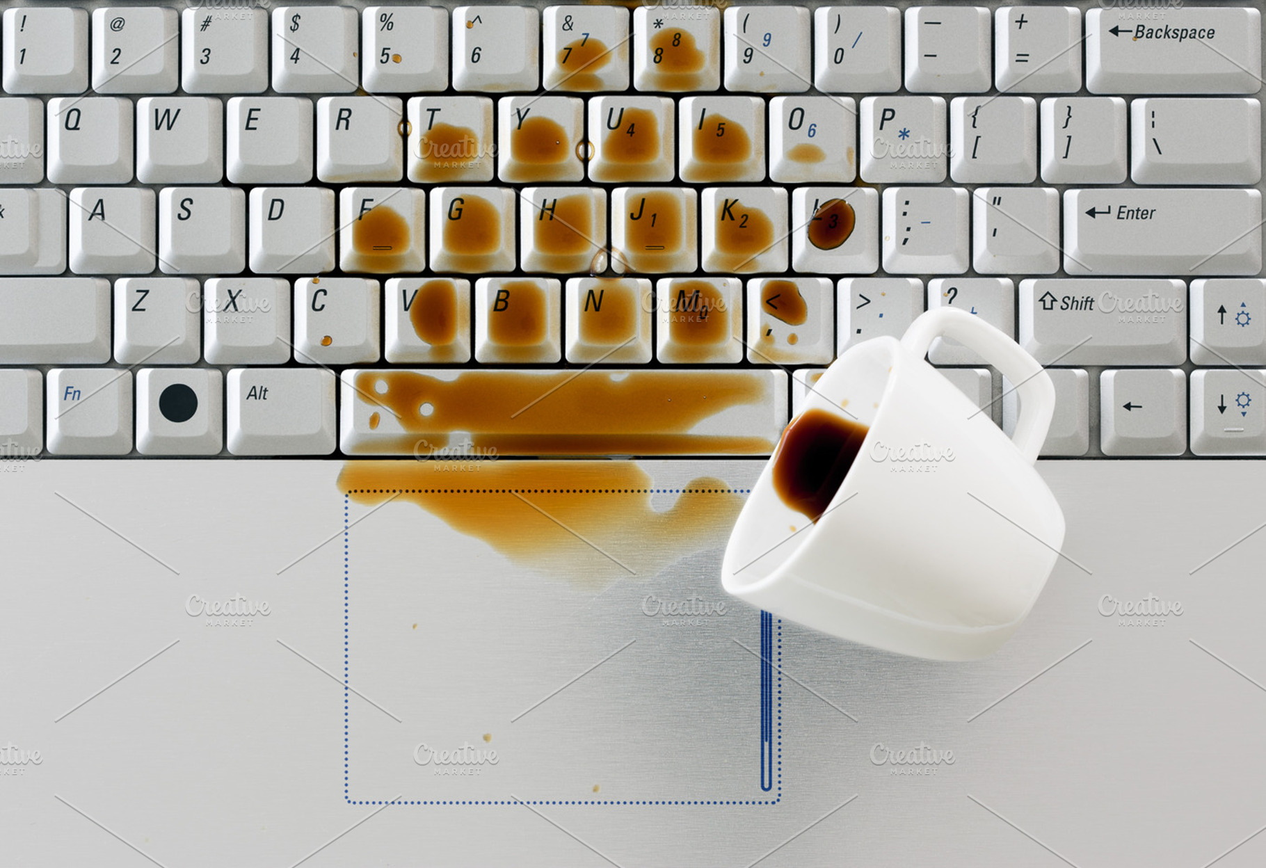 Coffee spilled on keyboard, a Business Photo by Pakete Art