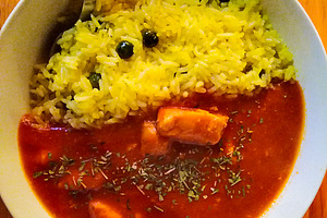 Rustic codfish with rice and olives in tomato sauce, a Food & Drink Photo by DanFLCreativo
