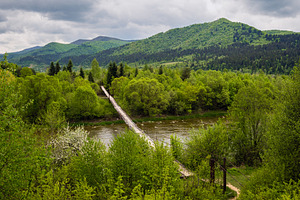 Spring picturesque river band view. Mountains scenery view behin