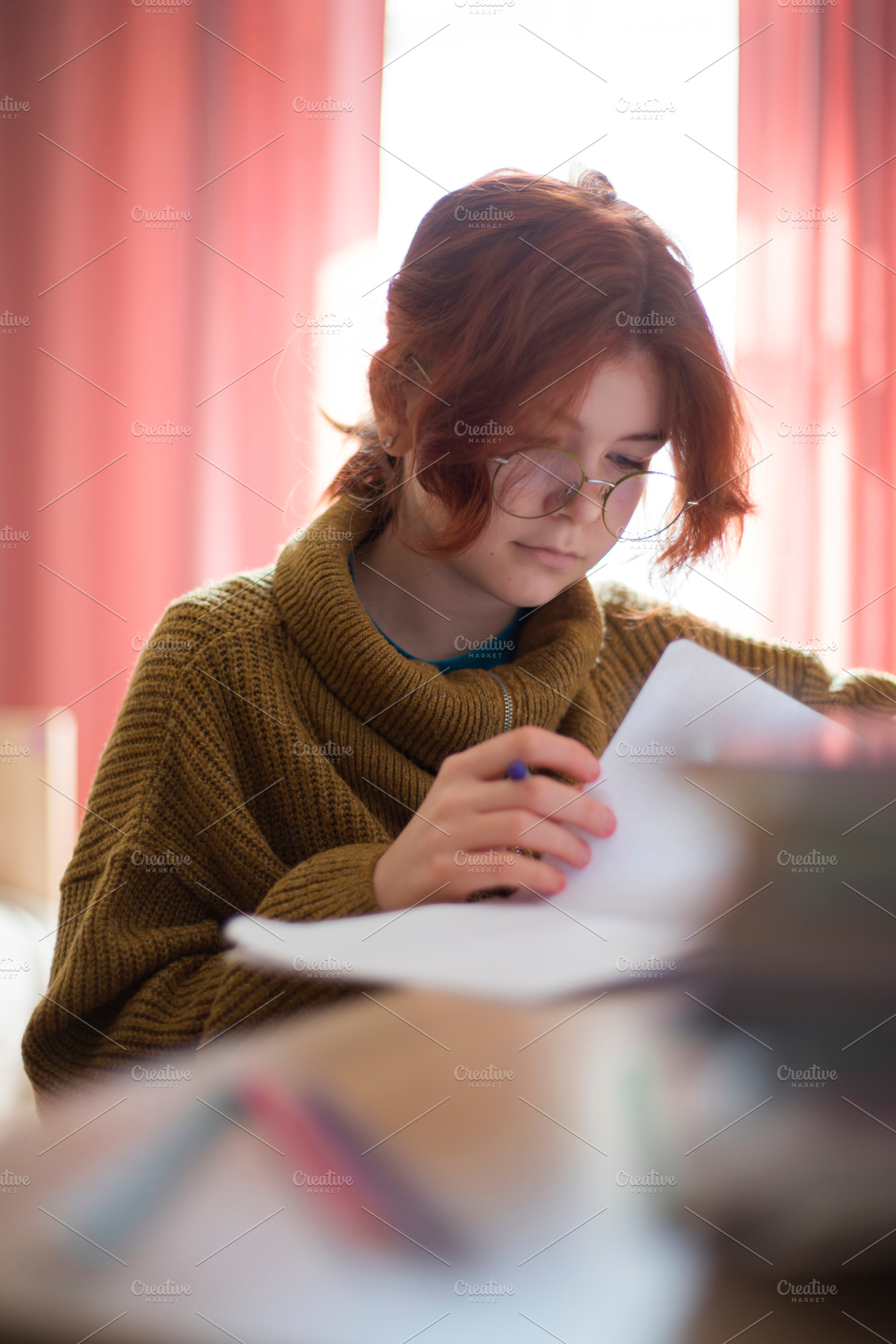 schoolgirl with glasses doing homework., a Photo by Pictures for you!!!!!!!!!