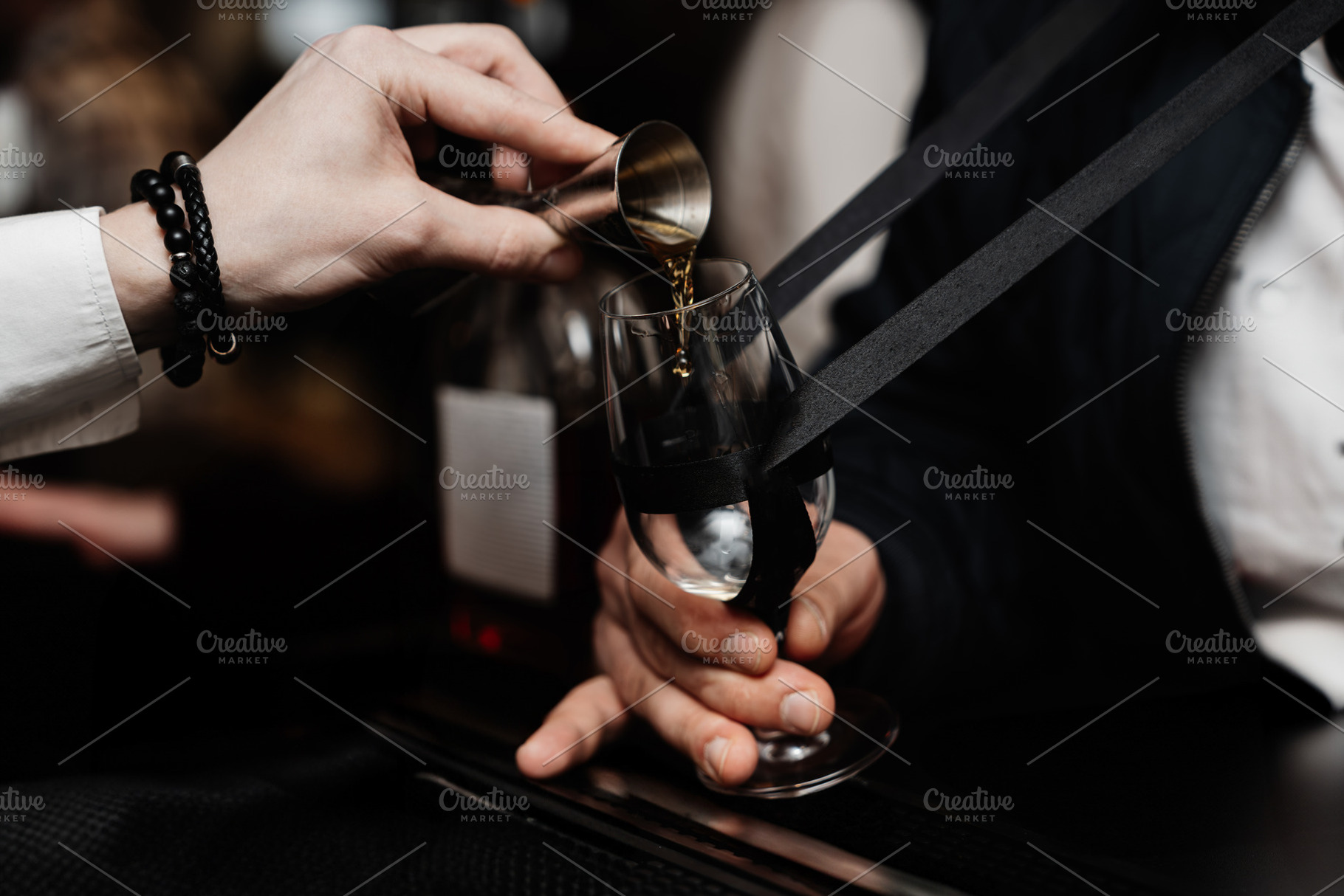 Bartender pours whiskey for tasting., a Food & Drink Photo by Rov.7