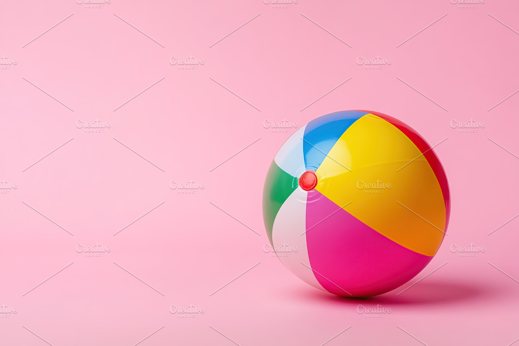Bright and colorful beach ball resting on a pastel pink surface in a playful se, an Arts & Entertainment Photo by AlyaAnd