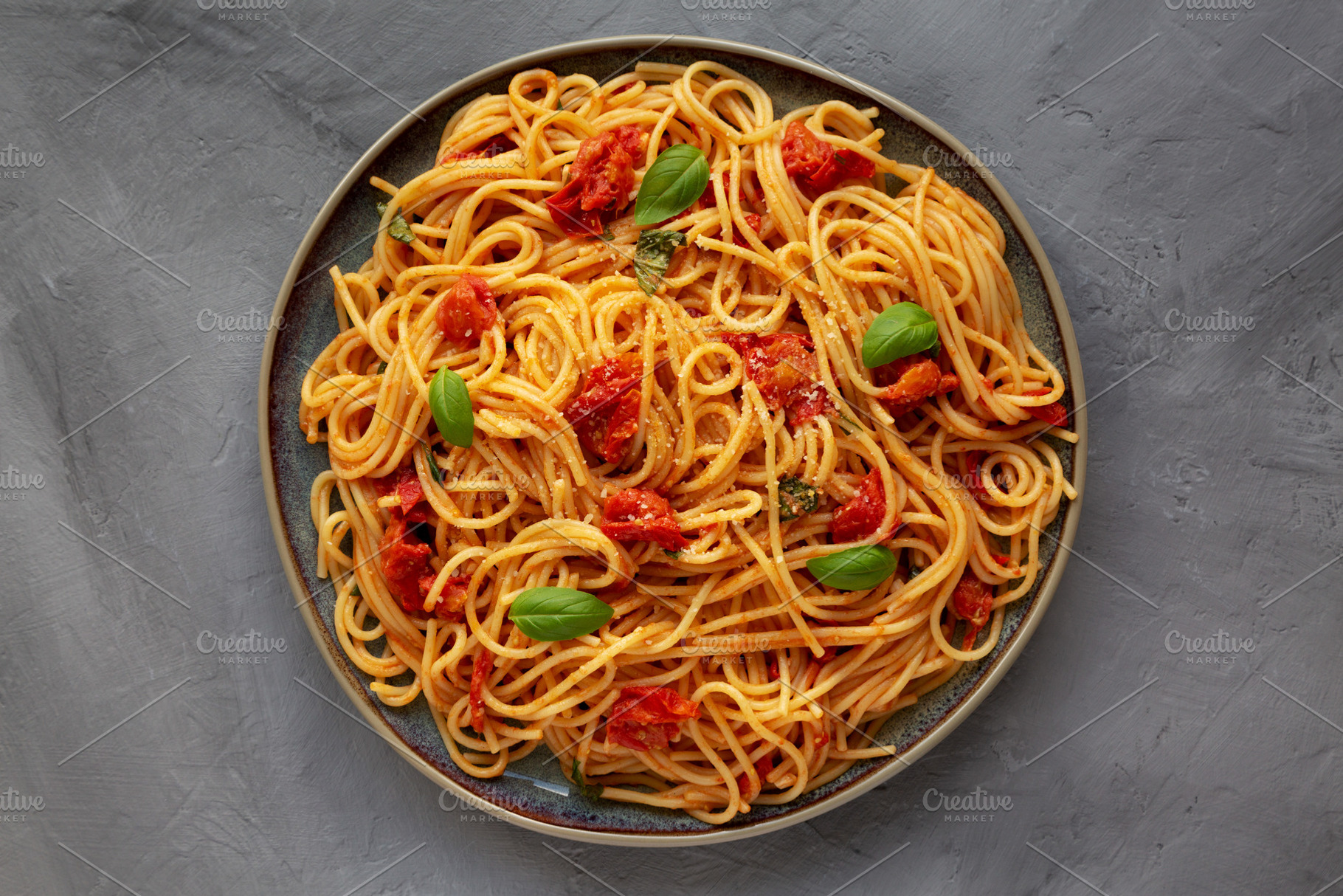 Homemade Spaghetti Pasta with Fresh Tomato Sauce on a Plate on a, a Food & Drink Photo by LiudmylaChuhunova