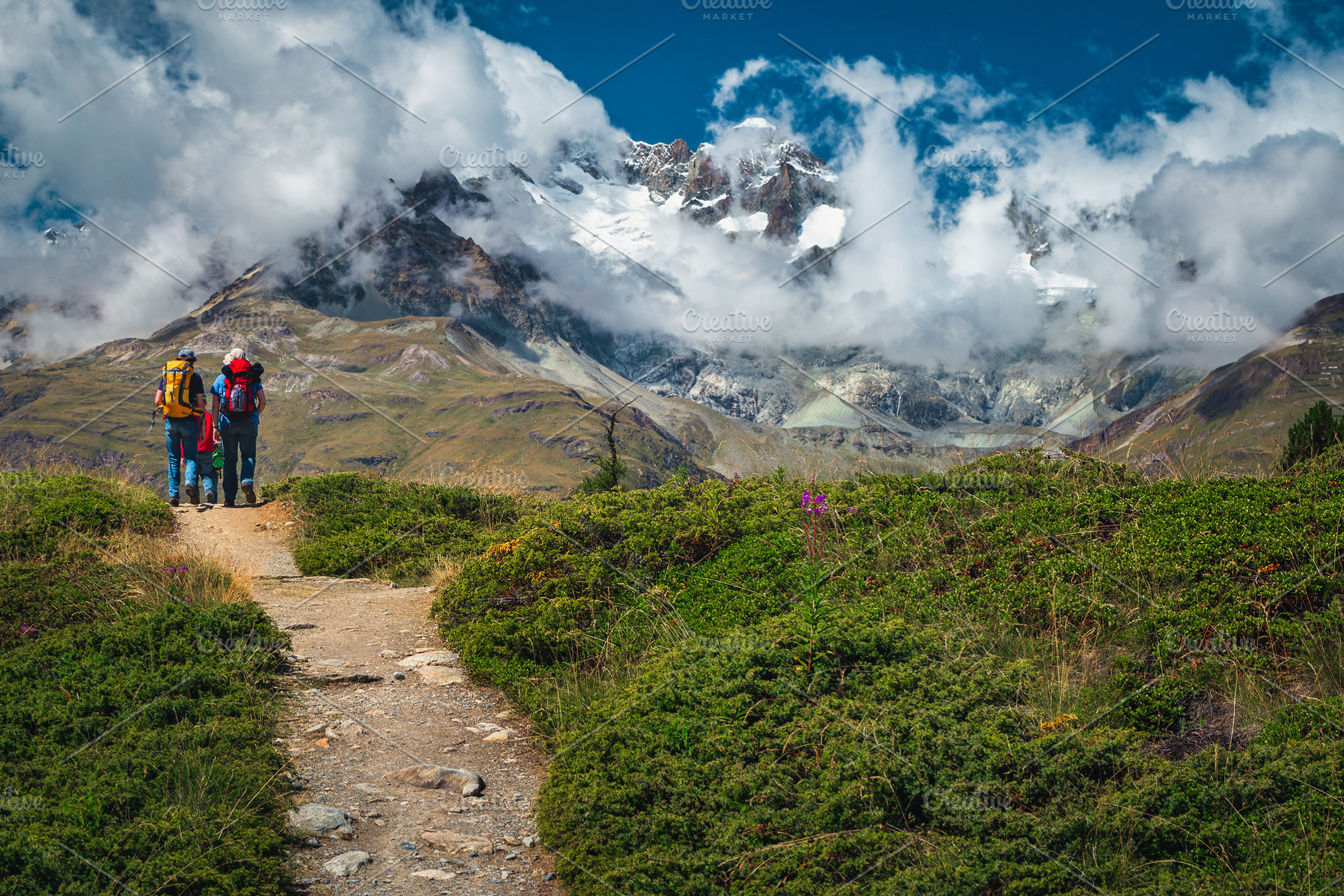Hiker group on the mountain trail, a Sports & Recreation Photo by Alpine Dreams