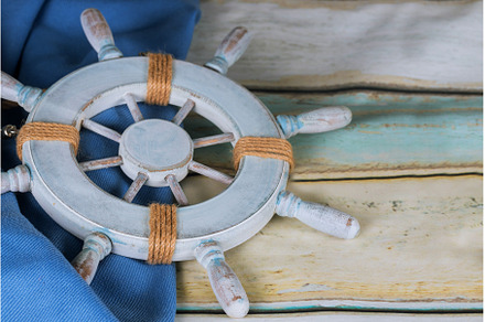 Light blue background with captain's, a Holiday Photo by Ungvar Studio