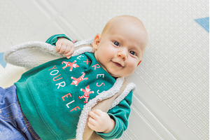 Adorable baby dressed in a Christmas, a Holiday Photo by Elizaveta Galitskaya