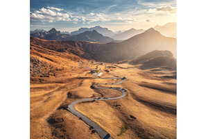 Aerial view of road in mountain, a Nature Photo by den-belitsky