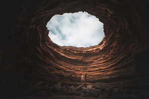 Sea cave featuring explore, travel, and cave