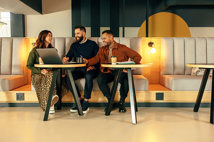 Modern entrepreneurs working together in a lobby, a Person Photo by Jacob Lund