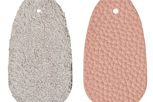 Two oval samples of soft pink genuine leather showing a smooth f, an Abstract Photo by ndanko