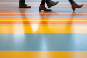 Motion blur of people walking on colorful floor, a Person Photo by AlyaAnd