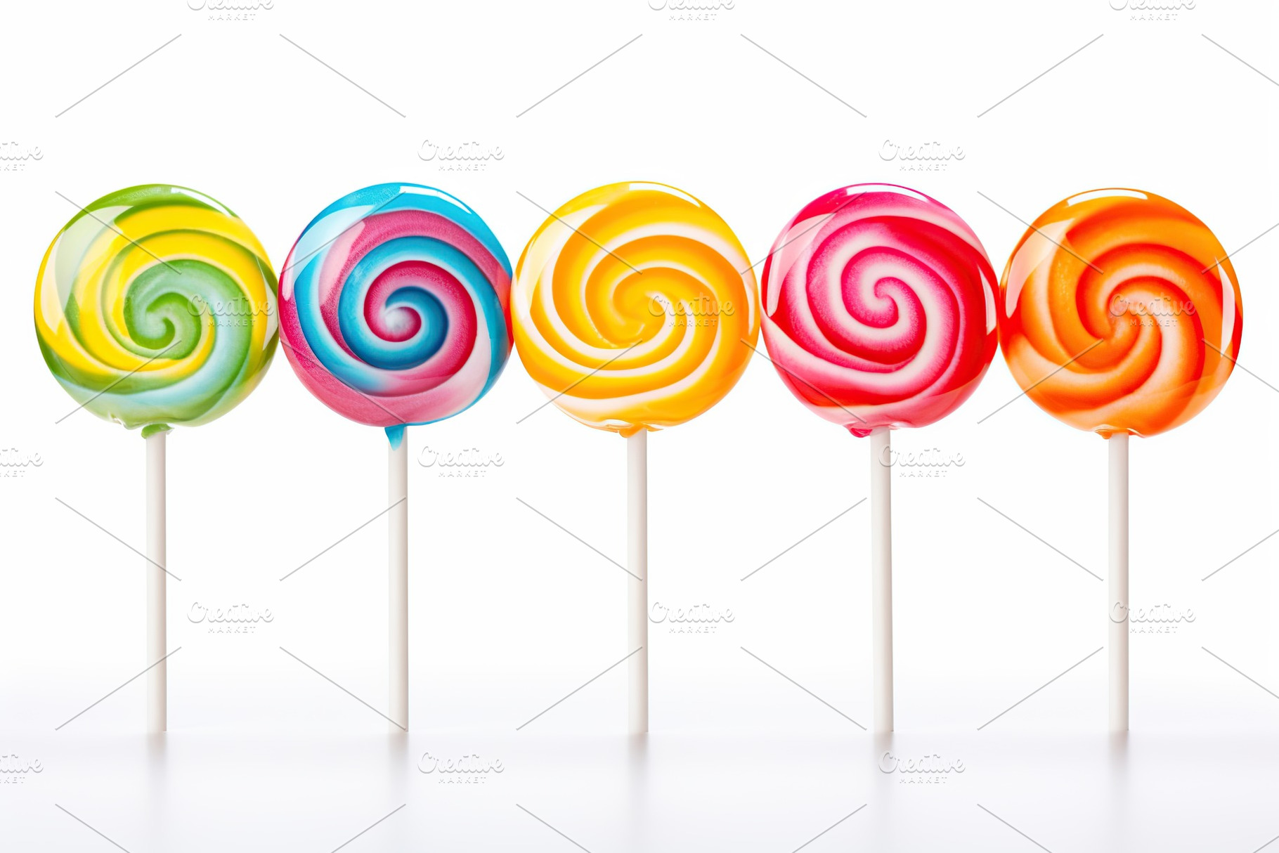 Colorful rainbow lollipops on white background, a Food & Drink Photo by AlyaAnd