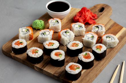 Homemade Sushi Platter with Wasabi and Soy Sauce on a Board, low, a Food & Drink Photo by LiudmylaChuhunova