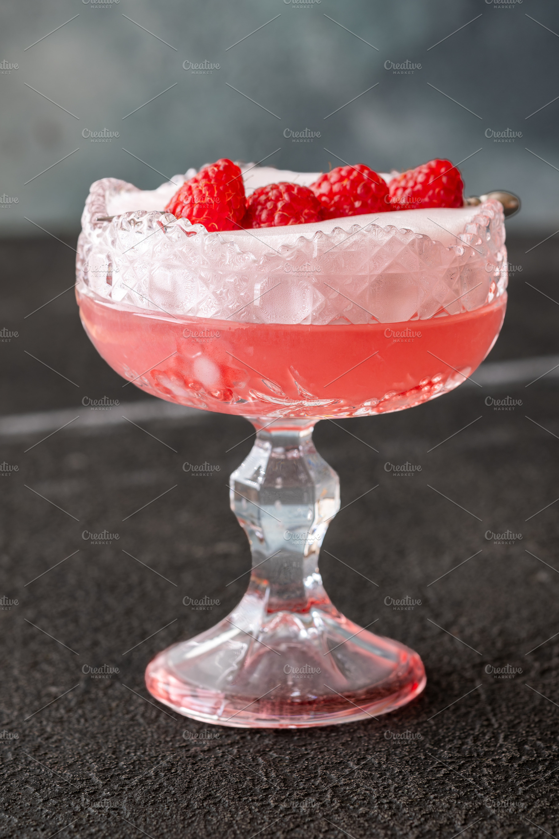 Elegant Clover Club cocktail with velvety foam fresh raspberries, a Food & Drink Photo by Alexander Prokopenko