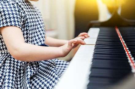 Girl playing piano, close up., an Arts & Entertainment Photo by Super duper stock images 