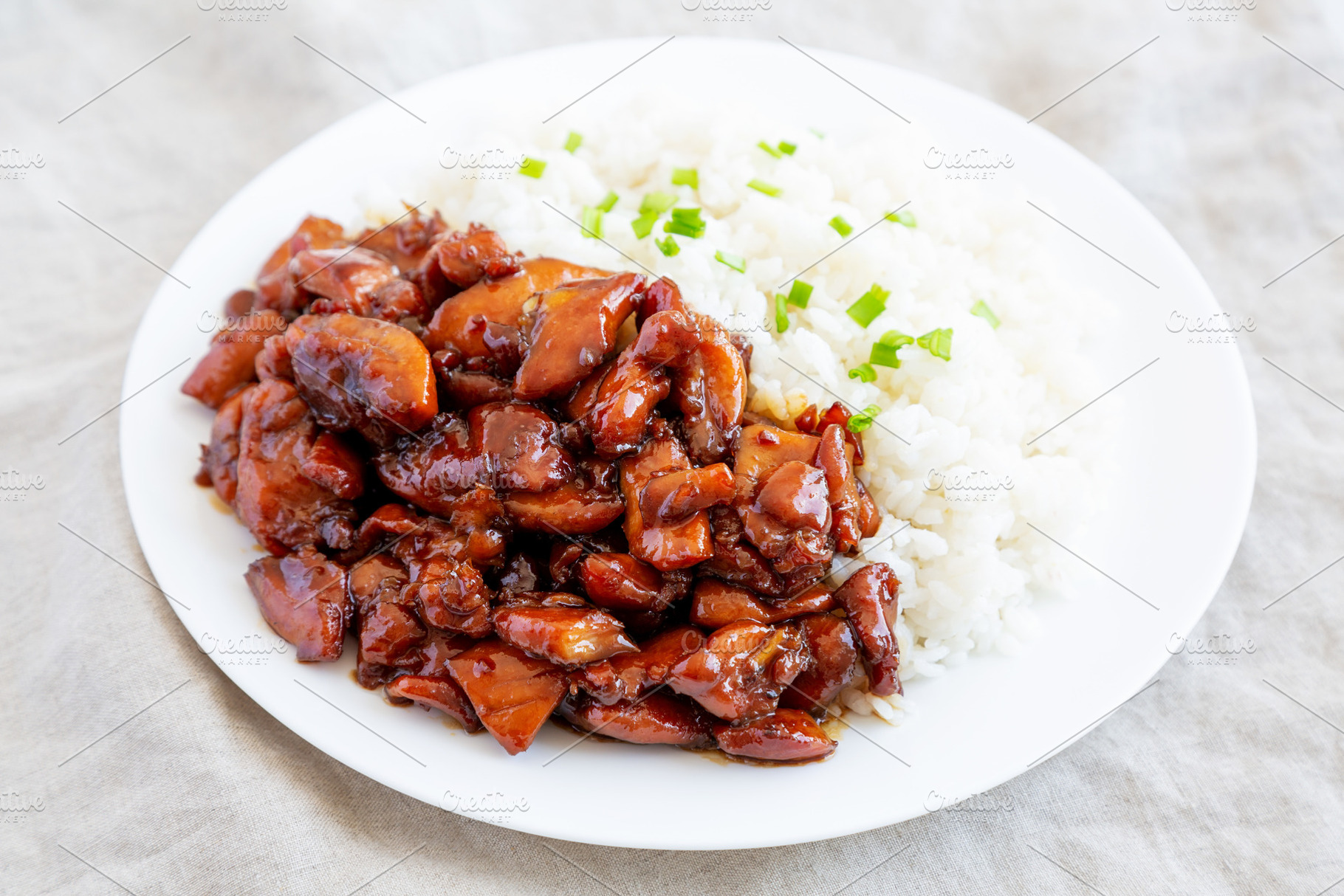 Homemade Teriyaki Chicken with White Rice on A Plate, side view., a Food & Drink Photo by LiudmylaChuhunova