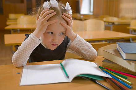 Little girl in school class at the l stock photo containing girl and school, a School & Education Photo by oleghz