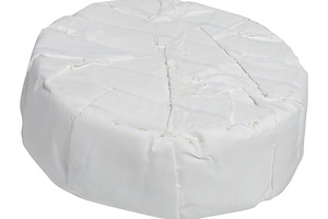 A whole head of round Camembert cheese on an isolated background, a Food & Drink Photo by ndanko