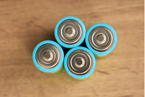 Four AA batteries are arranged in a, a Technology Photo by darksoul72