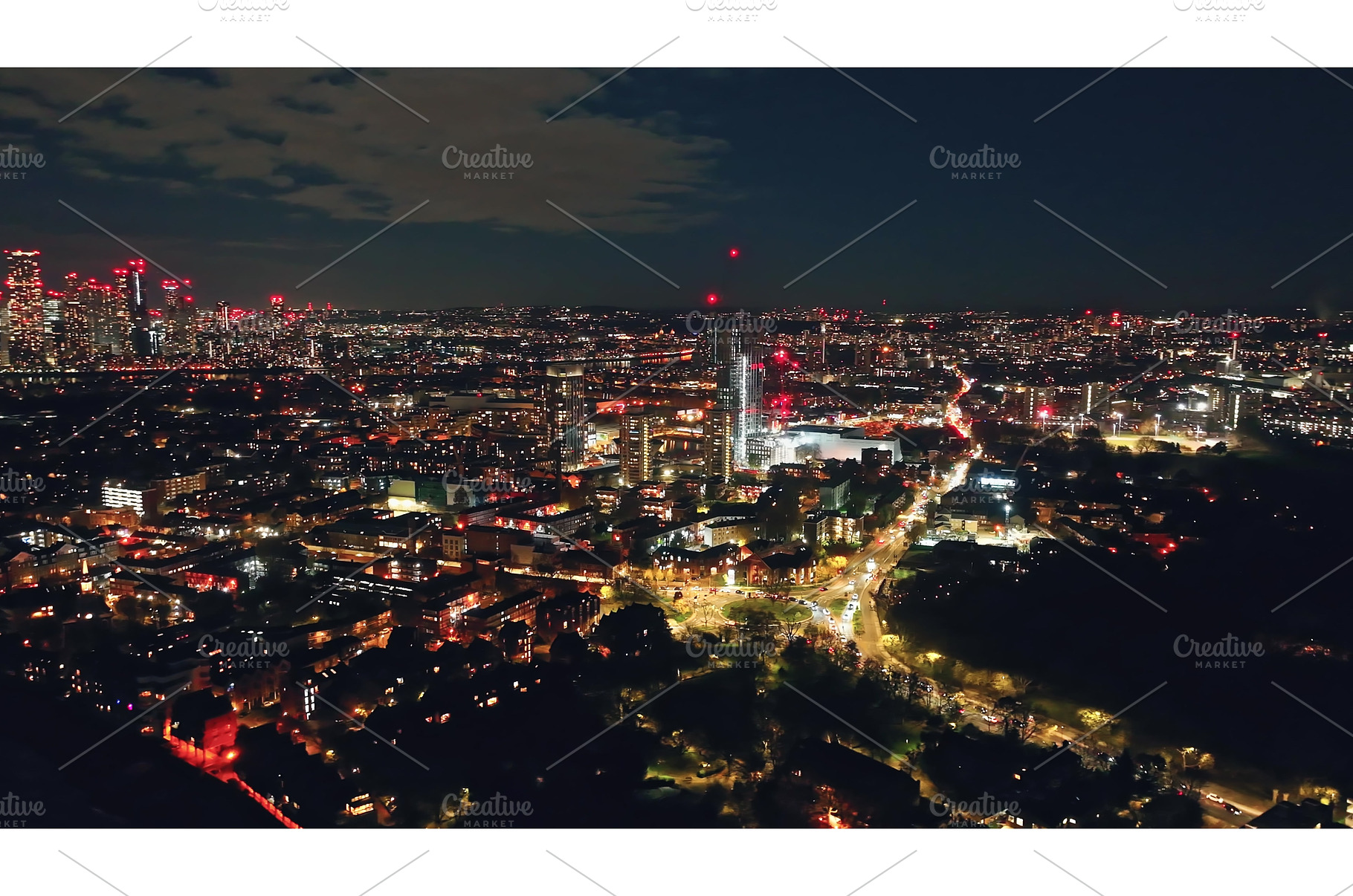 London glowing at night seen from a, an Architecture Photo by Goinyk