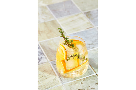 Refreshing cocktail with ice, orange, a Food & Drink Photo by Irina Burakova
