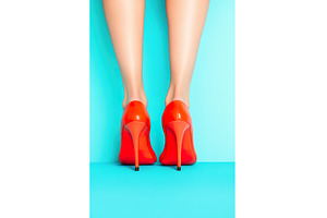 Bright red high heels against blue, a Beauty & Fashion Photo by Lermont51