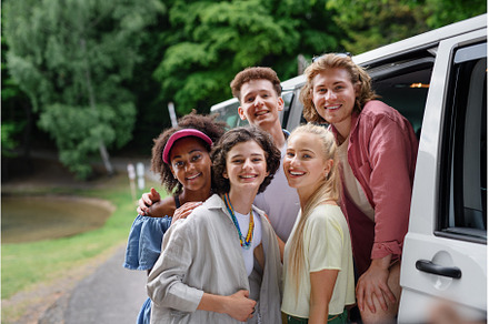 Multiracial young friends travelling, a Person Photo by HalfPoint