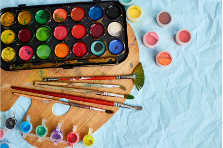 Flat lay of colorful paints, an Arts & Entertainment Photo by IlliaBondarPhotography