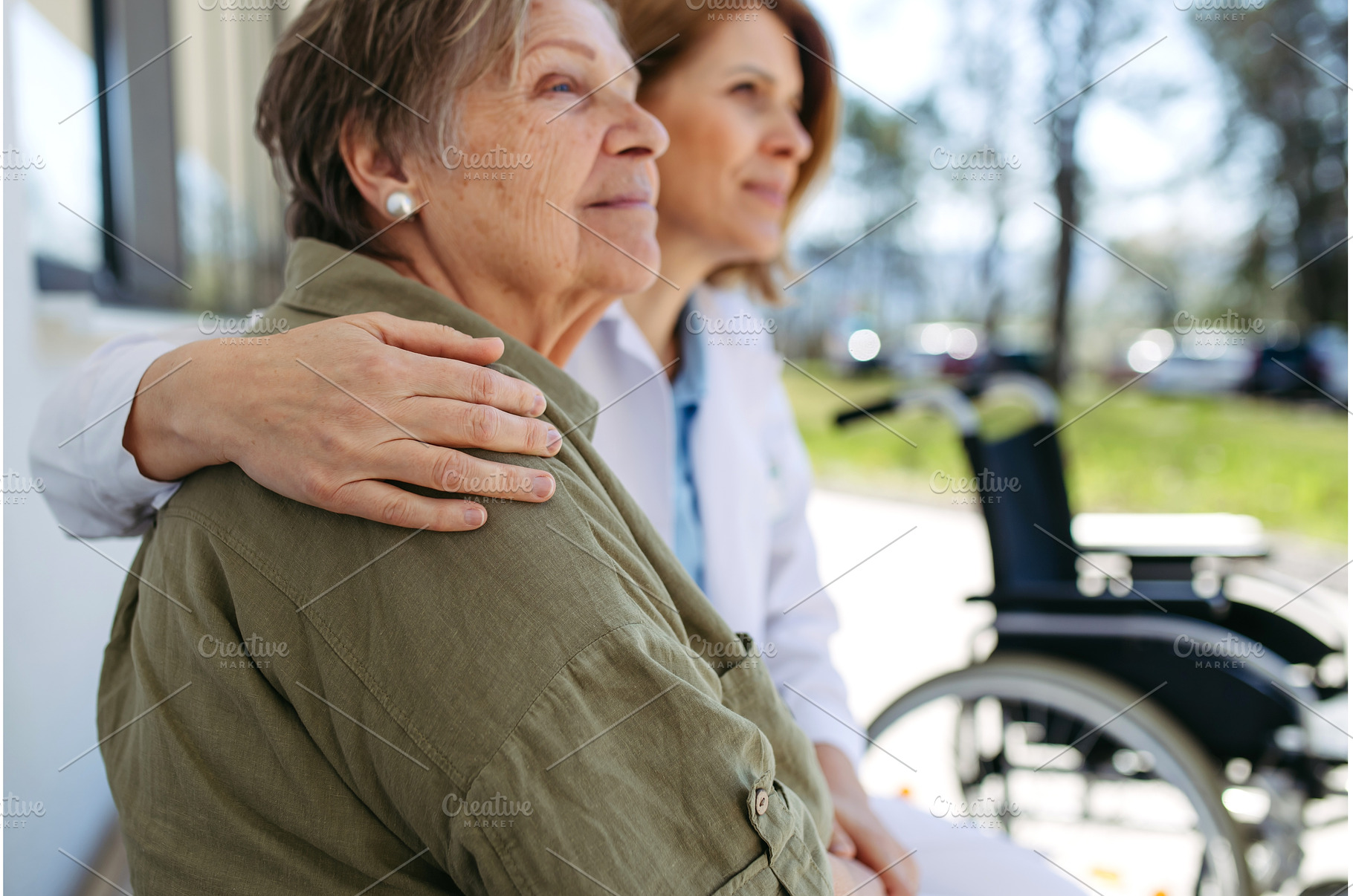 Doctor and elderly patient sitting, a Health & Medical Photo by HalfPoint