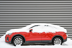 Modern car covered in snow in winter, a Transportation Photo by BOOCYS