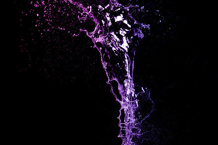 Long stream of fresh transparent water isolated on black backgro, an Abstract Photo by ndanko