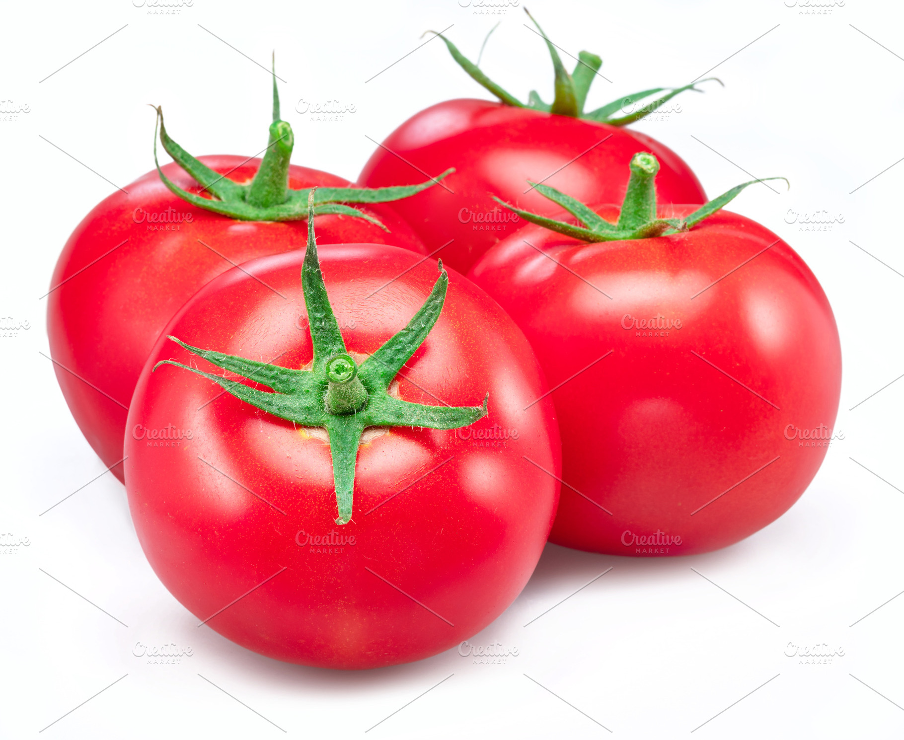 Red tomatoes isolated on white, a Food & Drink Photo by Volff