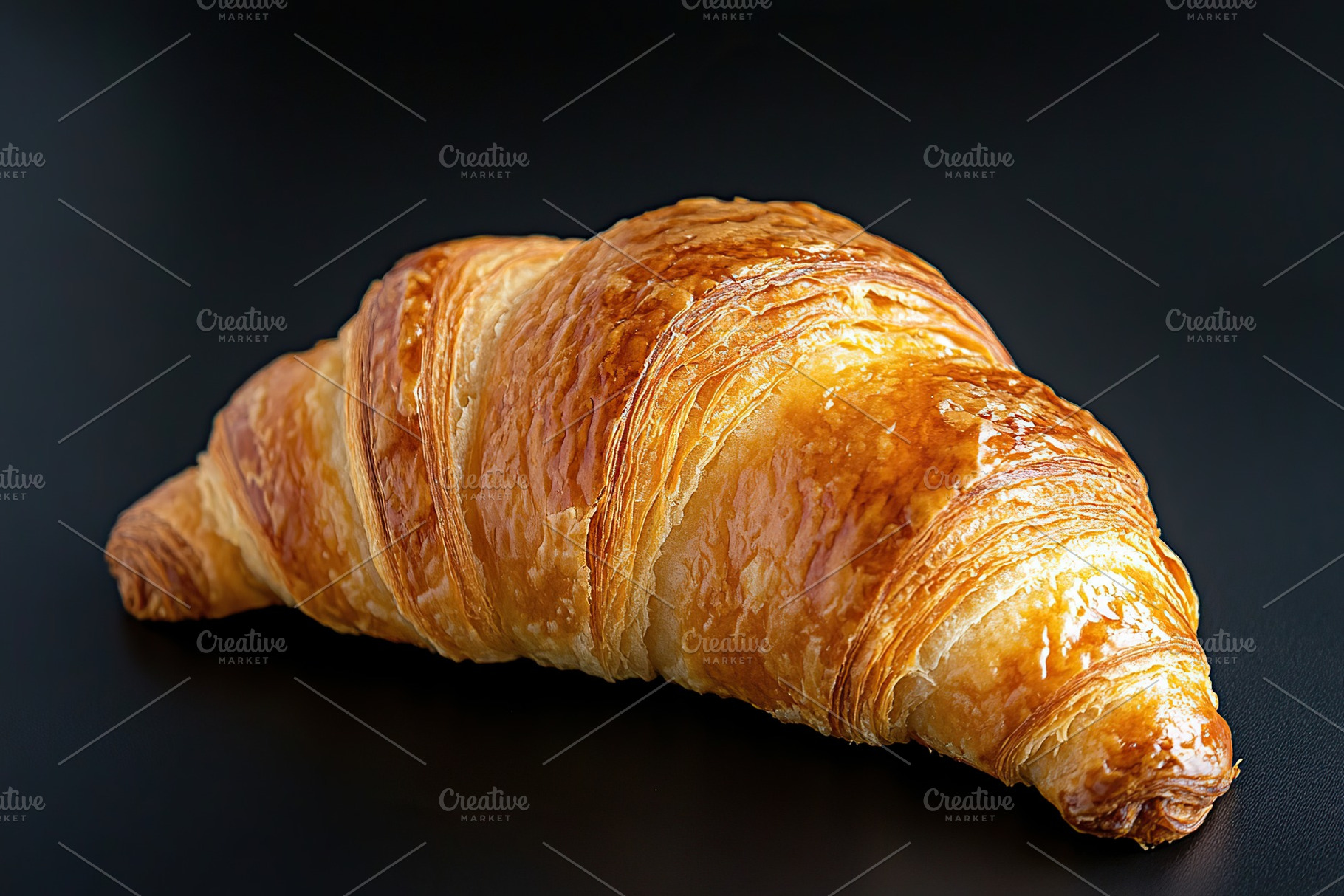 French pastry croissant on black background, a Food & Drink Photo by AlyaAnd