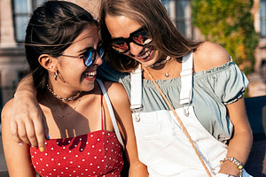 Young female friends enjoying a walk stock photo containing women and walk