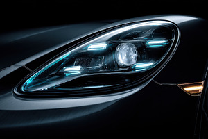 Car headlight shines at night, a Photo by Beautiful things