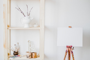 Easel paints background containing easel, artist, and canvas