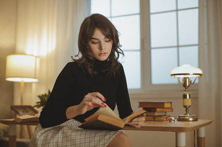 Woman reading book at home stock photo containing book and home, a Person Photo by Emotion photo