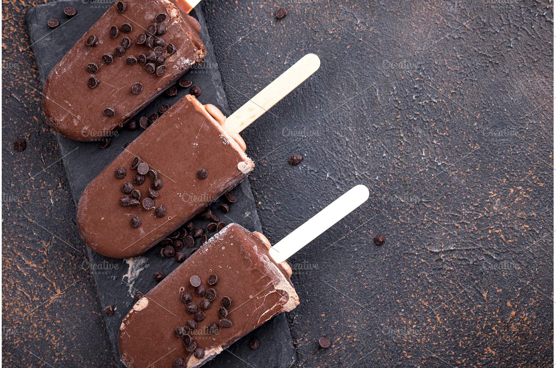 Chocolate ice cream popsicles in, a Food & Drink Photo by Yulia Furman