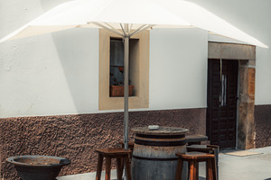Barrel table with umbrella shade, an Industrial Photo by SkyNext
