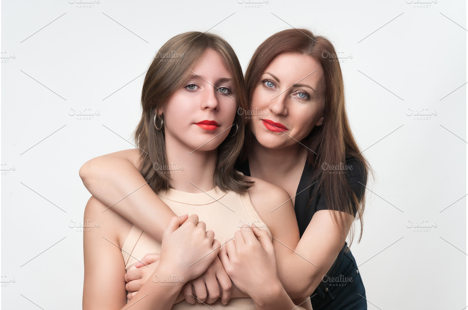 Portrait of mom and teenage daughter, a Person Photo by Alexander-Piragis