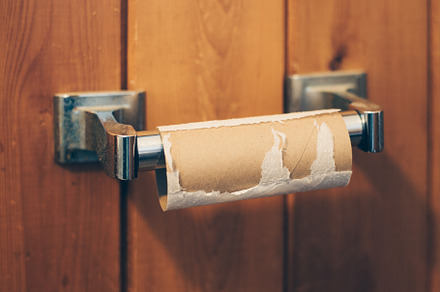 Empty toilet paper roll featuring bathroom, cabin, and close