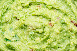 Guacamole sauce texture closeup., a Food & Drink Photo by Volff