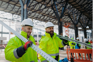 Construction workers at work on, an Industrial Photo by HalfPoint