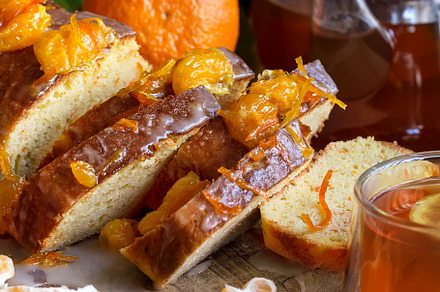 Tangerine cake with tea featuring cake, dessert, and food