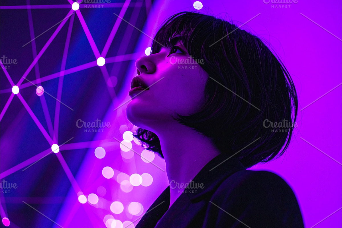 Young adult woman in a dark suit gaze upward a neural‐network, a Person Photo by DanFLCreativo (Photo 2 of 2)