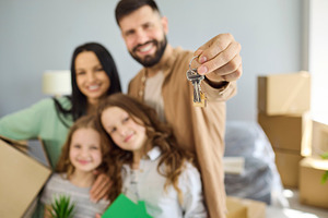 Family Holding New Apartment Keys