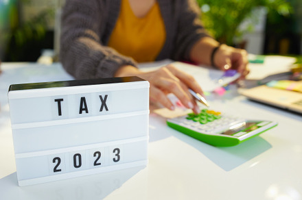 tax time. accountant woman working with documents, a Business Photo by Alliance Images