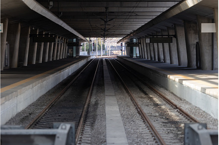 An empty subway track in a station., an Architecture Photo by Barcelona_dreams